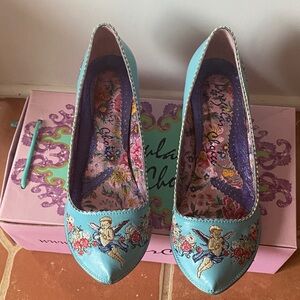 Unusual Sky Blue Embroidery on top and sides with heels.
